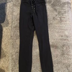 Black, lace up kittenish leggings